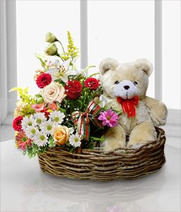 Flowers And Teddy In Basket